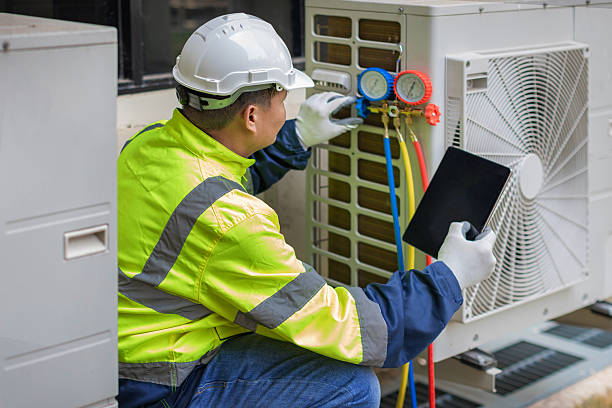Professional Hvac Maintenance technician working in Pisgah Forest, NC